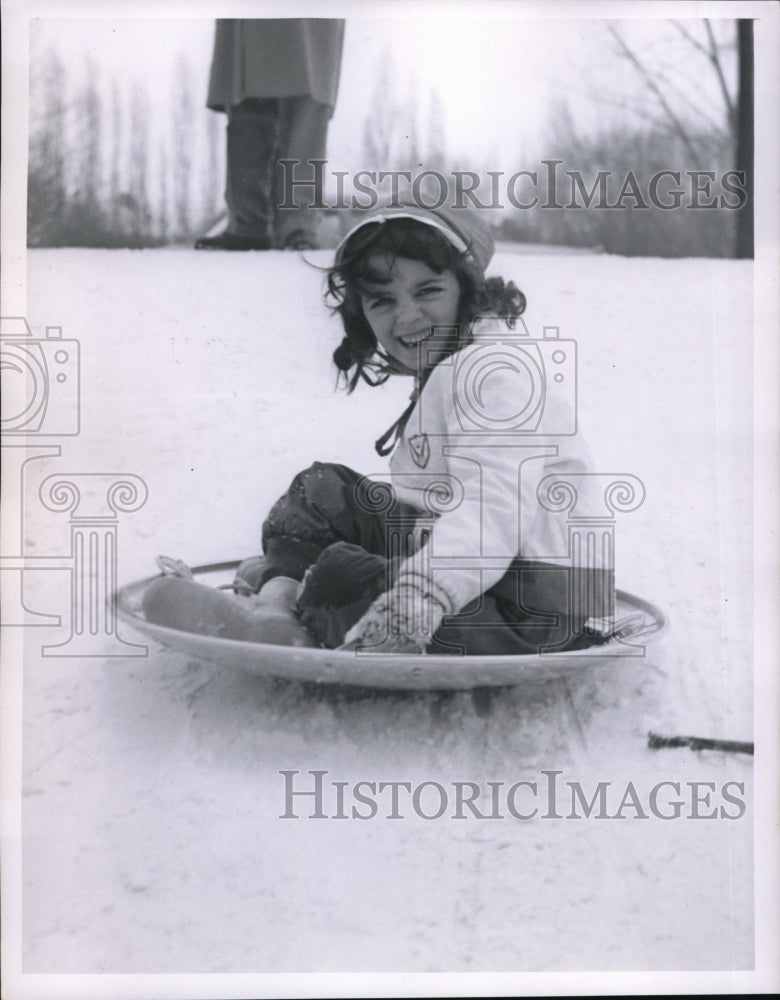 1956 Press Photo Scheryl Jackson on flying saucer at Cain Park