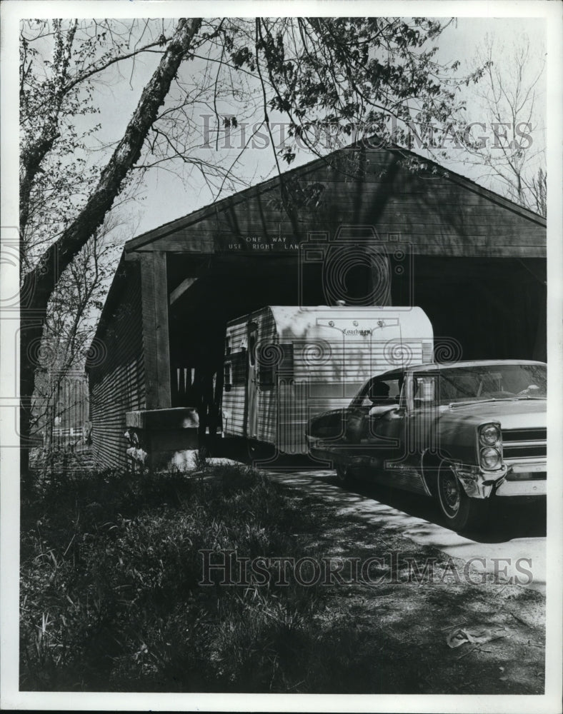 1968 Press Photo RV Crossing Under Bridge Rustic Road
