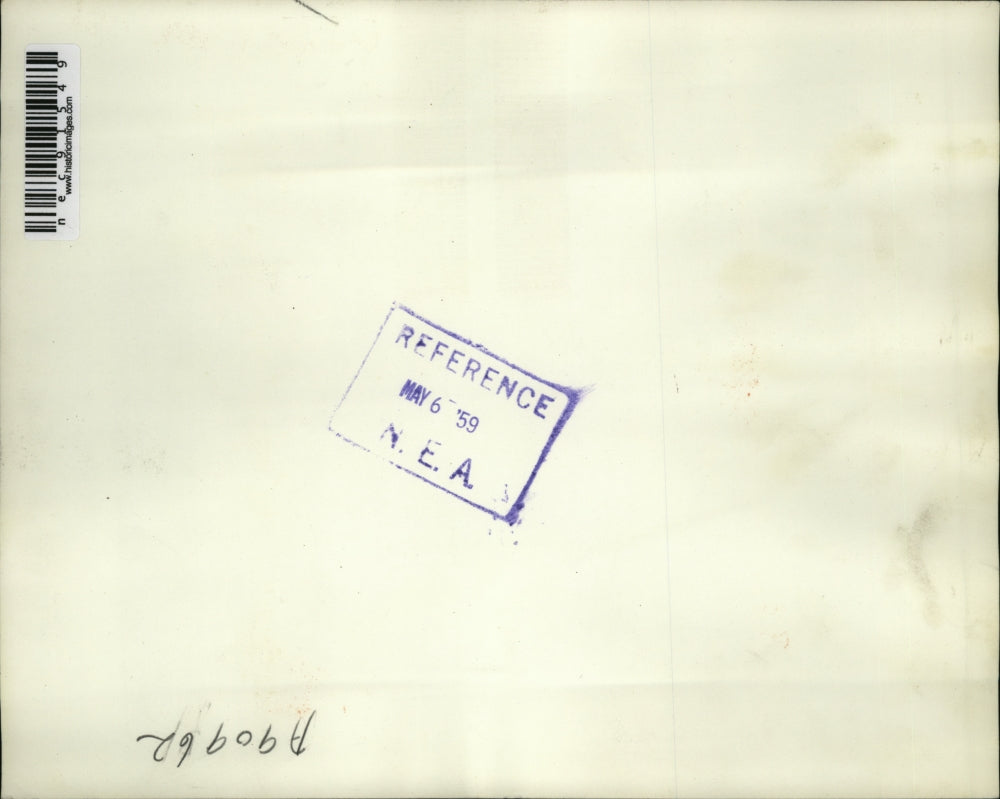 1959 Press Photo Rescuers carry Janet Wick,16 on beach at Puget Sound