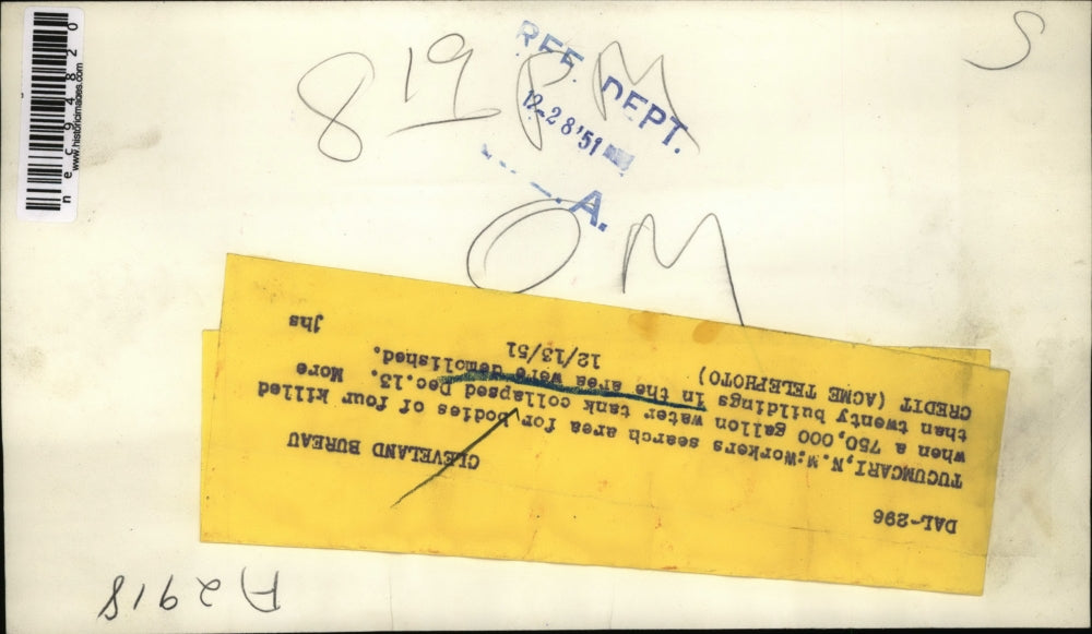 1951 Press Photo Workers search an area where a water tank collapsed.