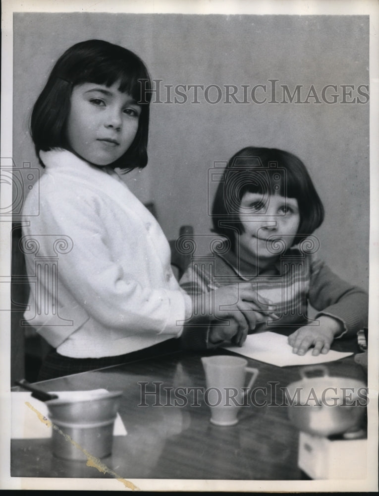 Load image into Gallery viewer, 1958 Press Photo A young bread winner Rosalia Mannara with her sister Lucia
