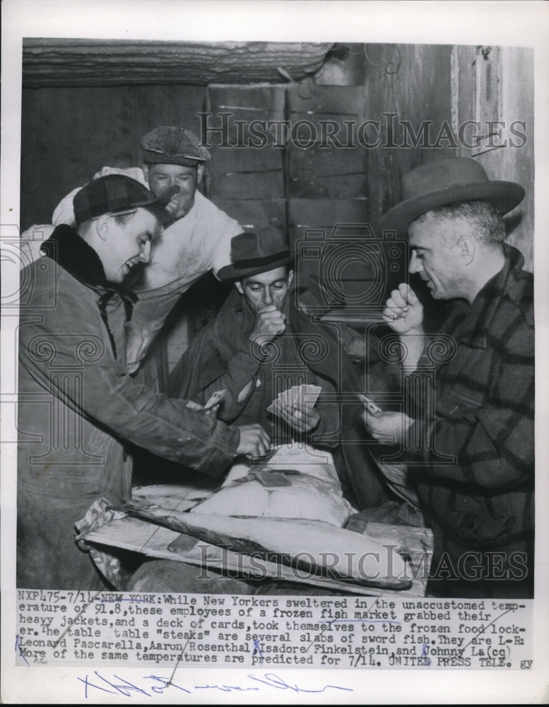 1954 Press Photo NYC employees at frozen fish market play cards in cooler