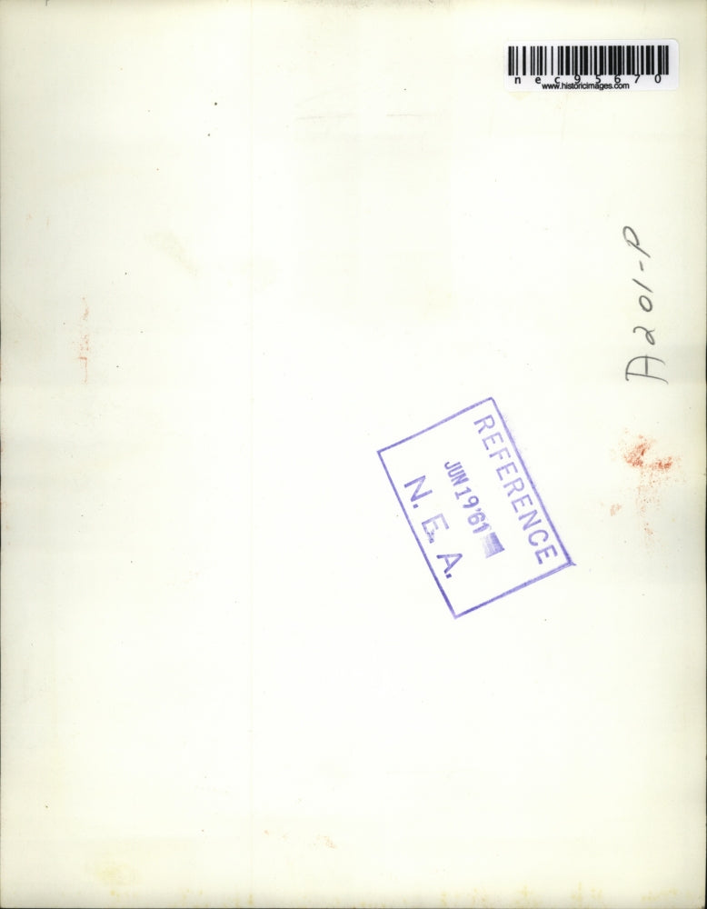 1961 Press Photo Animal Control employee Wayne Gibson removes porcupine