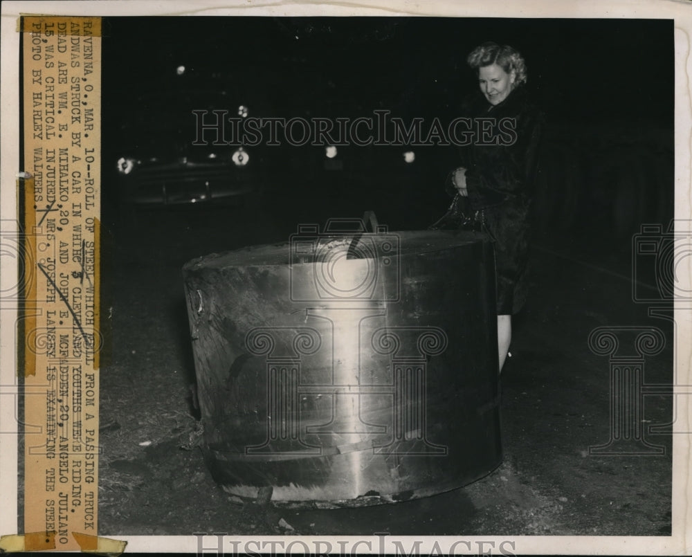 1948 Press Photo Roll of steel fell from truck & smashed an auto