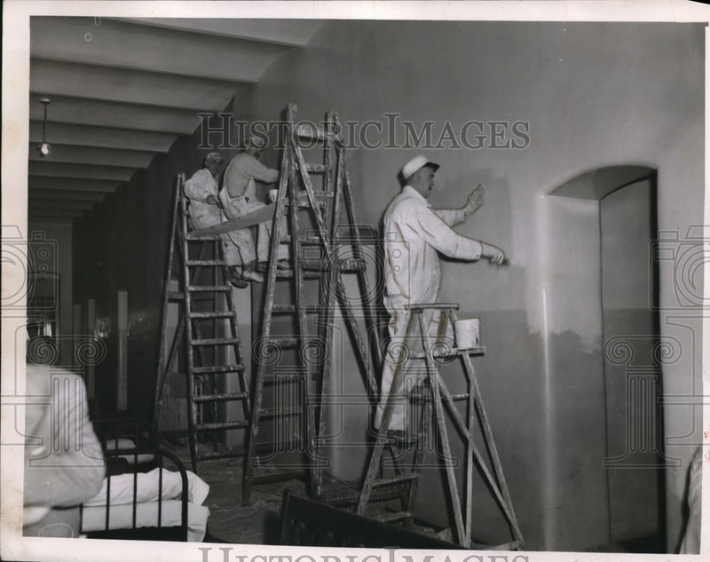 Load image into Gallery viewer, 1951 Press Photo Workmen painting a building in Cleveland Ohio - nec95981
