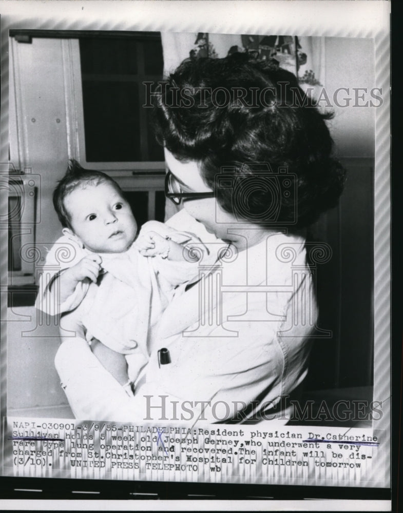 Load image into Gallery viewer, 1955 Press Photo Dr Catherine Sullivan Holds 5 week old Joseph Gerney
