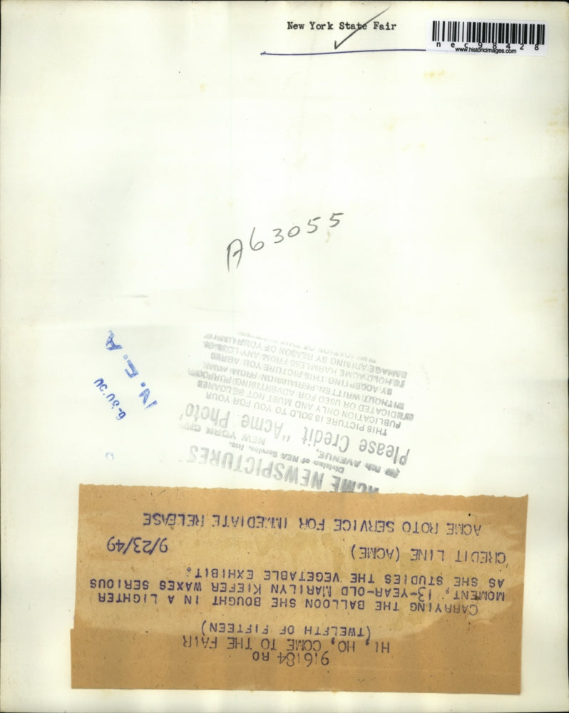 1949 Press Photo Marilyn Kiefer at vegetable display at NY State fair