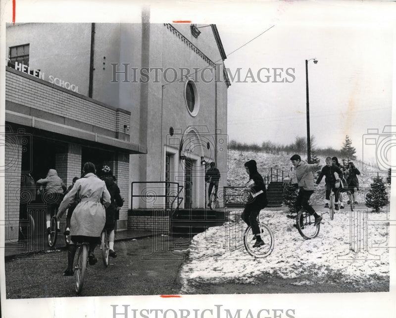Load image into Gallery viewer, 1970 Press Photo Newbury Ohio St Helen Parish School kids on unicycles
