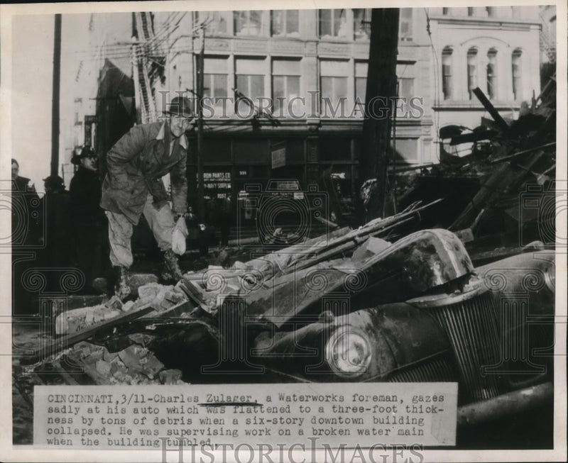 Load image into Gallery viewer, 1947 Press Photo Cinncinati Ohio Charles Zulager &amp; car under collapsed bldg
