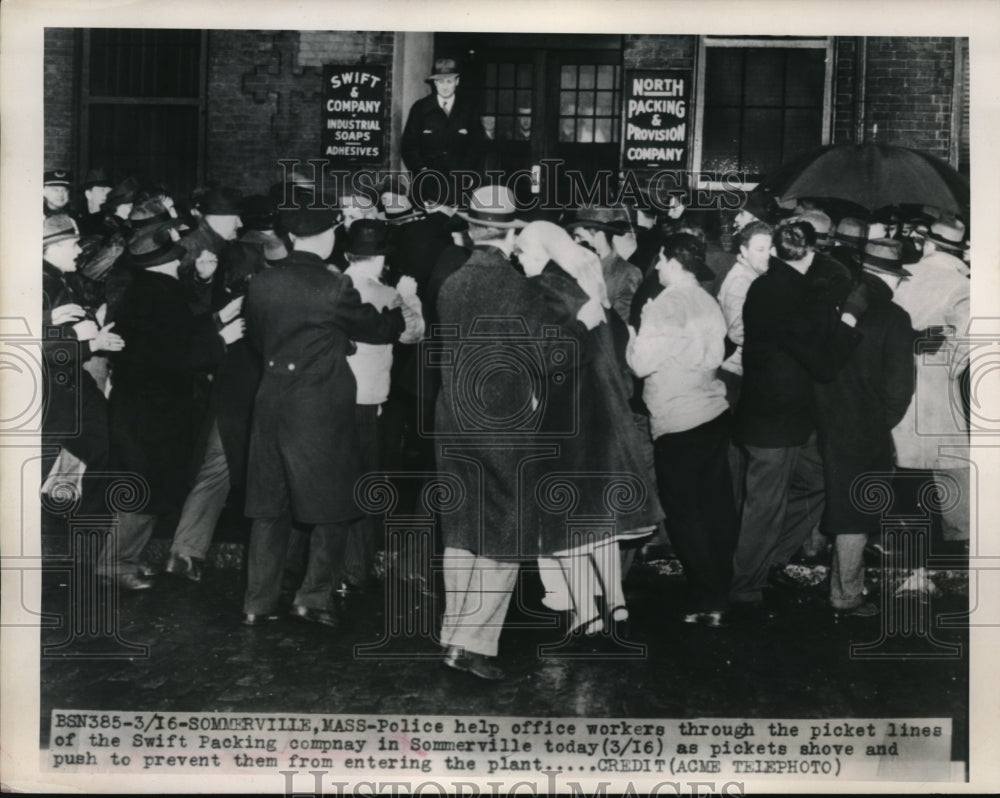 1948 Press Photo Police help workers through the picket lines at Swift Packing
