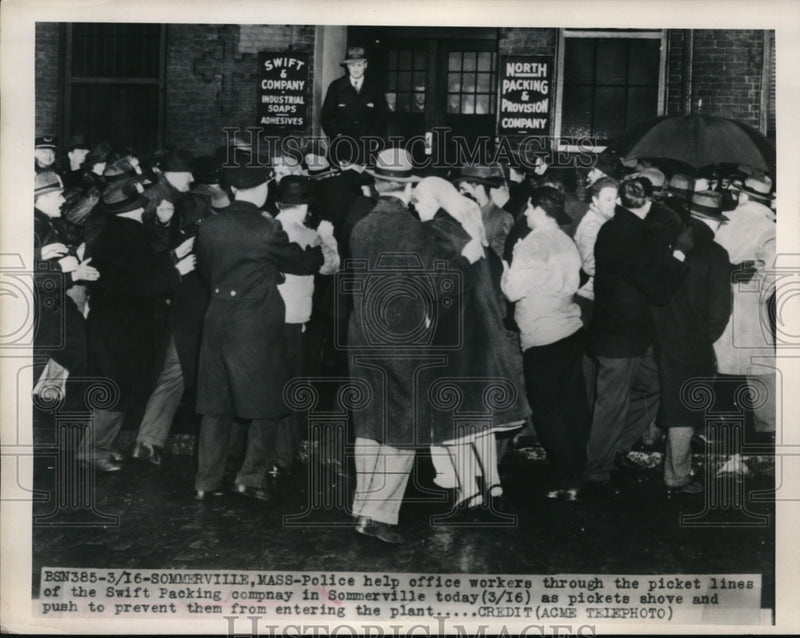 Load image into Gallery viewer, 1948 Press Photo Police help workers through the picket lines at Swift Packing
