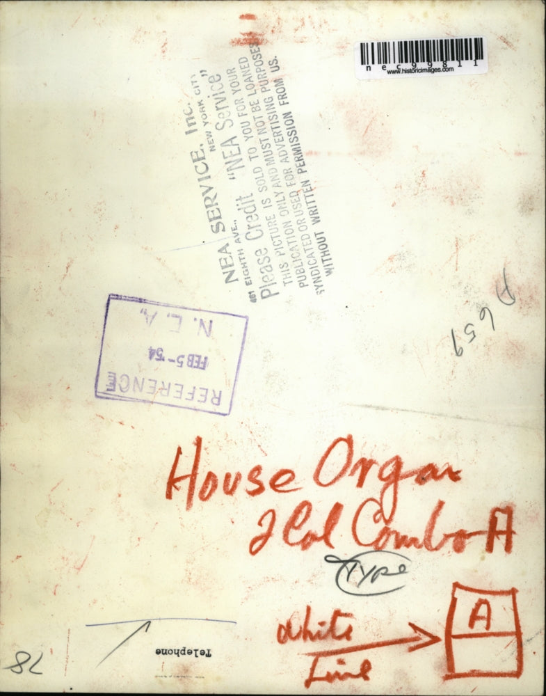 1954 Press Photo Woman using a telephone