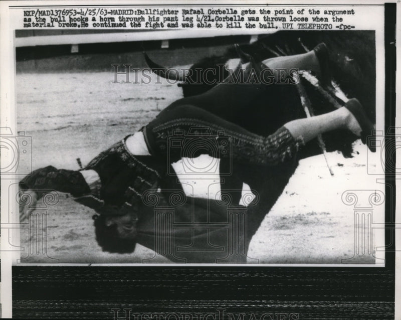 Load image into Gallery viewer, 1963 Press Photo Rafael Corbelle after the bull hooks a horn through his pants
