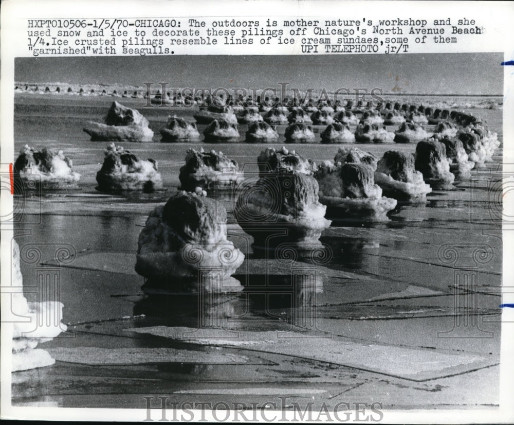 1970 Press Photo Snow and Ice Decorated Pilings Off Chicago's North Avenue Beach