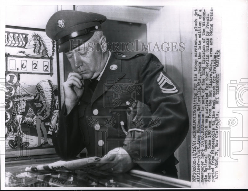Load image into Gallery viewer, 1961 Press Photo Sgt. Arne Matheson awaits his troop carrier
