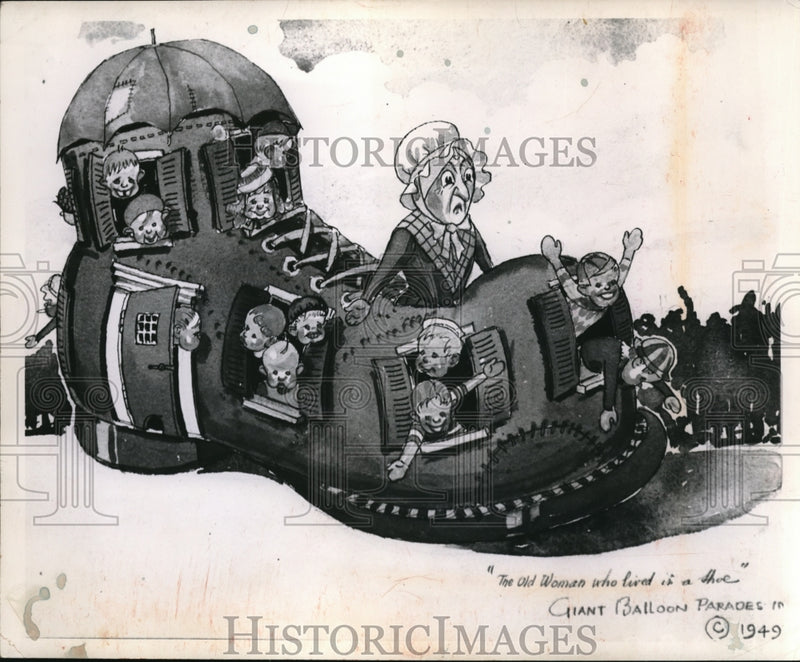 Load image into Gallery viewer, 1952 Press Photo The Old Woman in the Show, 14' tall and 26' long 1949 Parade
