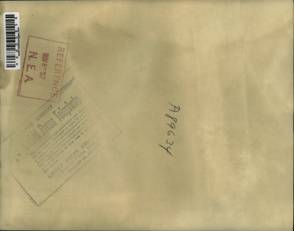 1957 Press Photo Francis X suffers from muscular dystrophy with Christmas gifts