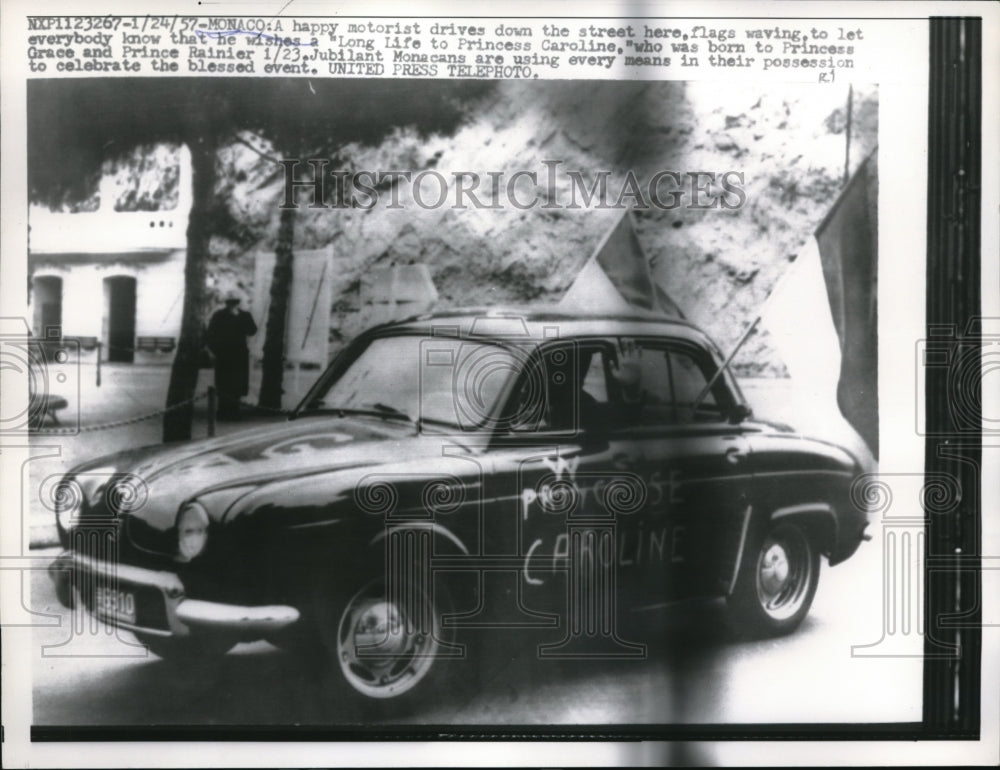 1957 Press Photo Monaco Motorists car with sign for Princess Grace