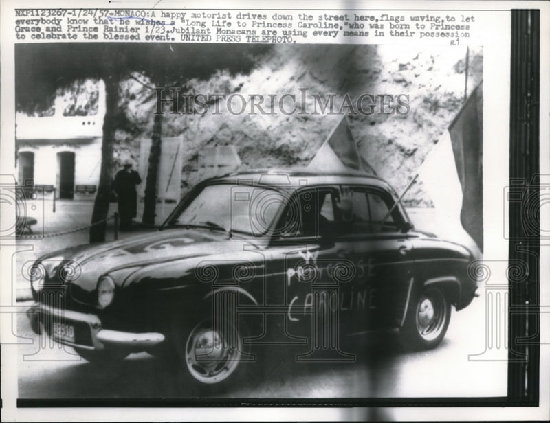 Load image into Gallery viewer, 1957 Press Photo Monaco Motorists car with sign for Princess Grace
