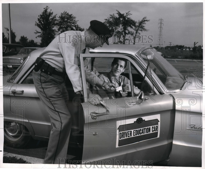 Load image into Gallery viewer, 1963 Press Photo Albert Keskenny passes final exam and has Driver Education Cert
