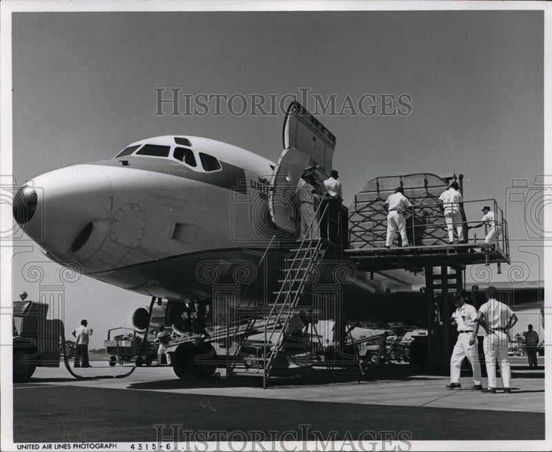 Load image into Gallery viewer, 1966 Press Photo United Airlines Jet is being finished out
