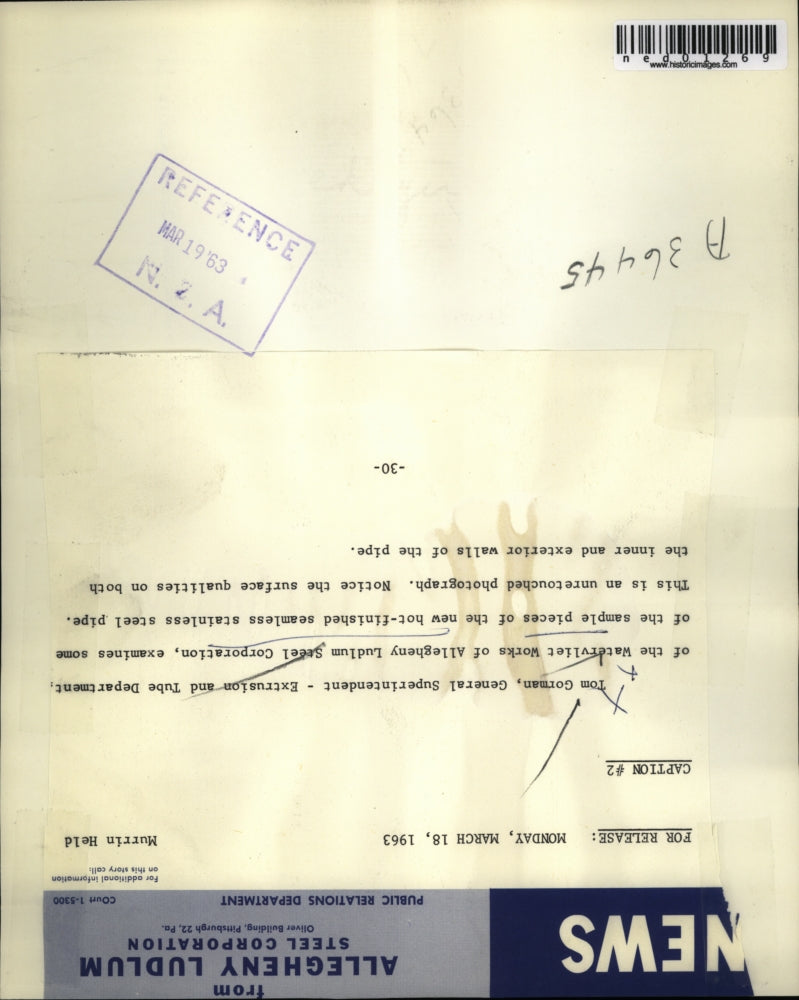 1963 Press Photo Tom Gorman inspects steel pipe, Watervliet Works