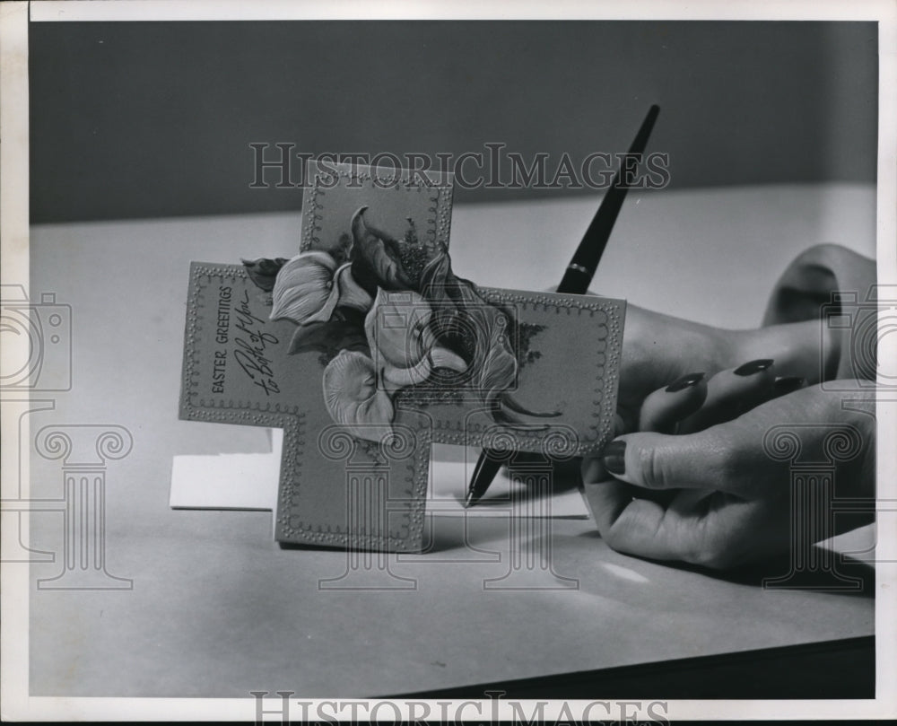 1949 Press Photo The new Easter card with the cross shape design