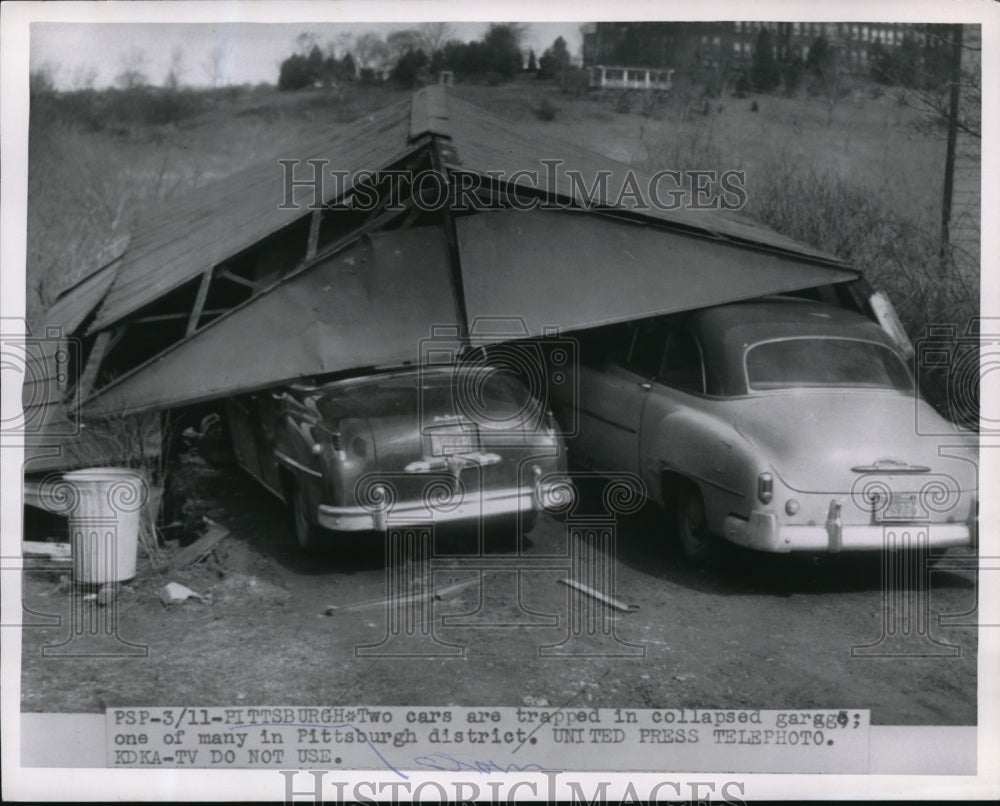 1955 Press Photo Two cars trapped in a collapsed garage in Pittsburgh.