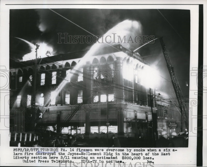 Load image into Gallery viewer, 1957 Press Photo A 6-alarm fire at the Joyce-McClement Building in Pittsuburgh
