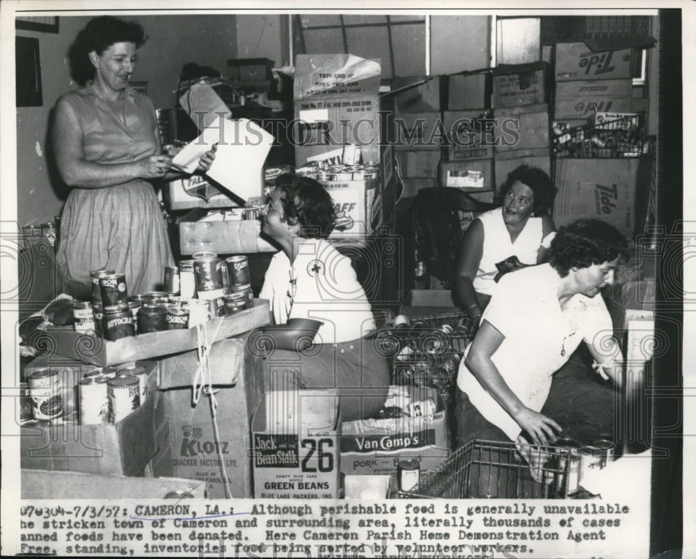 1957 Press Photo Cameron LA Parrish Home demo agent & canned goods