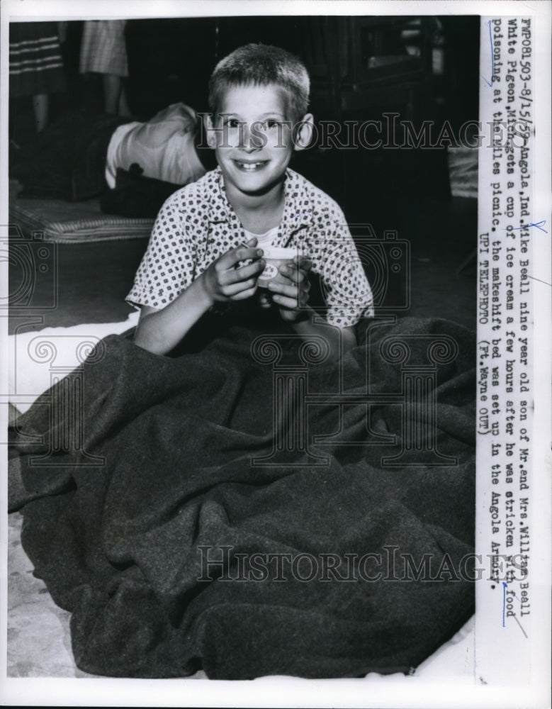 Load image into Gallery viewer, 1959 Press Photo Angola Ind Mike Beall age 9 recovers from food poisoning

