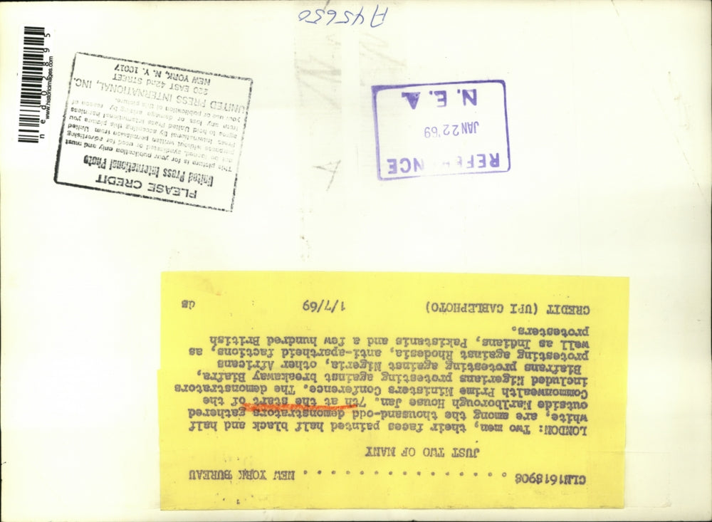 1969 Press Photo Demonstrators faces half black & half white in Marlborough