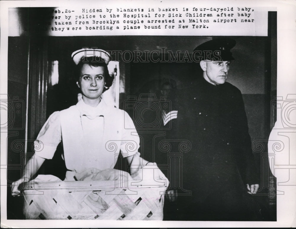 1953 Press Photo Four-day-old baby was turnover by the police at the hospital