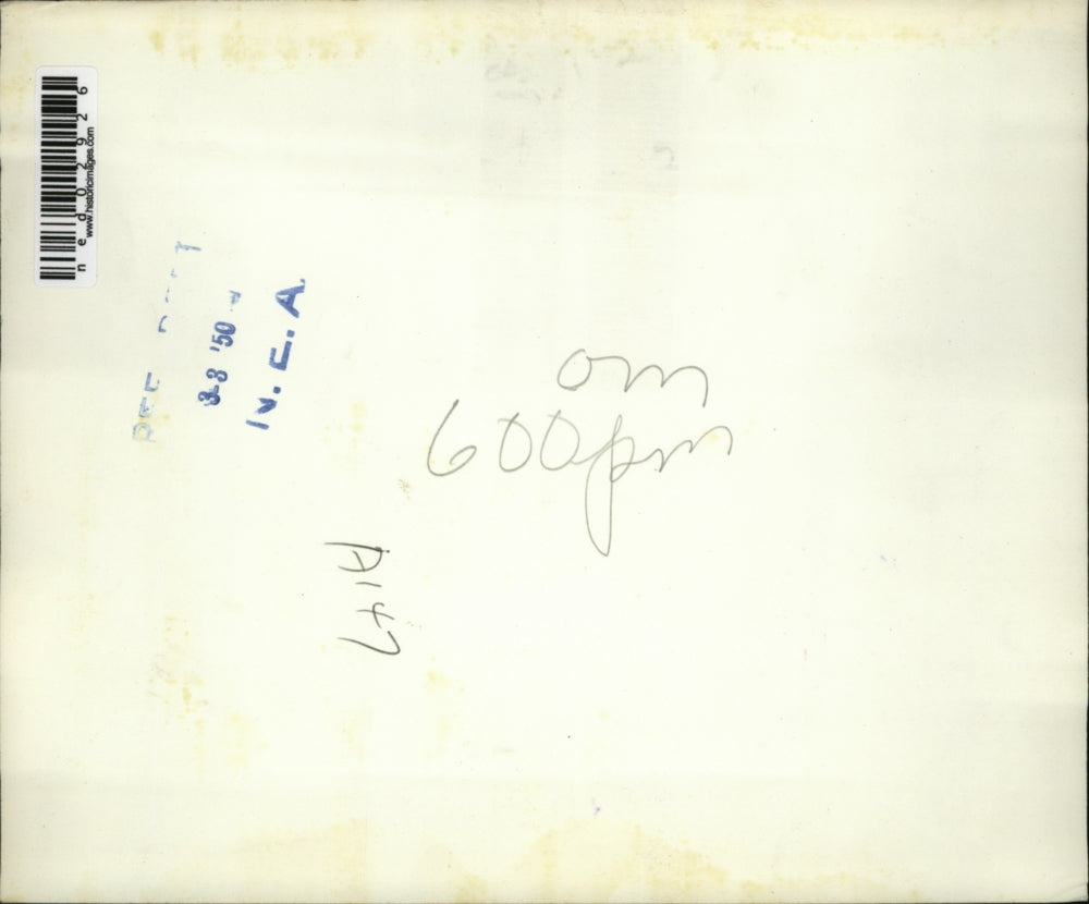 1950 Press Photo Unidentified woman reporter stands by the bed - ned02926