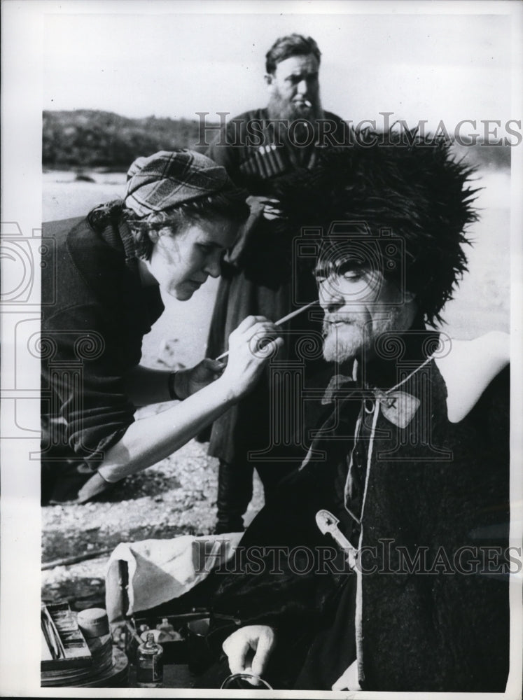 1961 Press Photo Makeup artist Nina Antonova on face of actor Yaragi Subairaev
