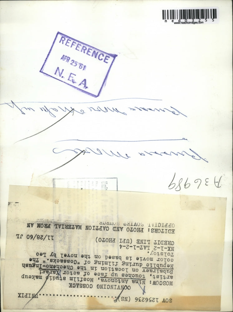 1961 Press Photo Makeup artist Nina Antonova on face of actor Yaragi Subairaev