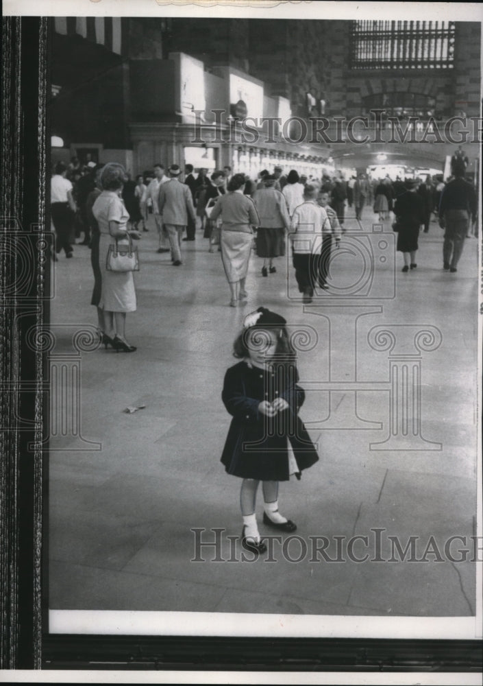 Load image into Gallery viewer, 1957 Press Photo Little Fahey bewildered for hours at the Grand Central Station
