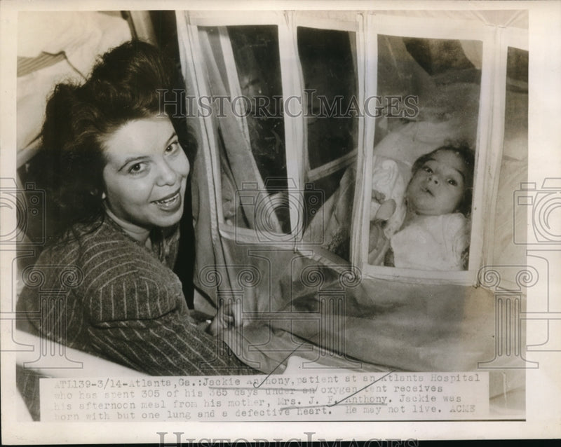 Load image into Gallery viewer, 1947 Media Photo Patient Jackie Anthony receives food from mother Mrs JF Anthon
