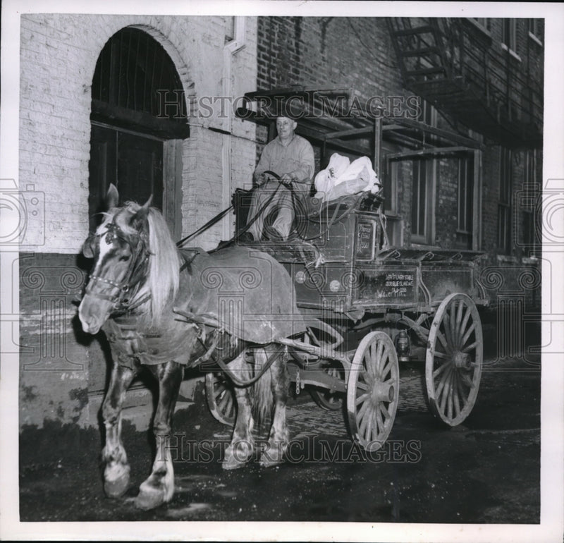 Load image into Gallery viewer, 1954 Press Photo Ex-fighter Meyer Jacobson on his delivery wagon
