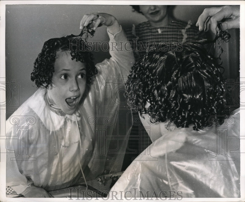 Load image into Gallery viewer, 1955 Press Photo Elaine's hair reminds her of a Puppy Dog caught in rainfall
