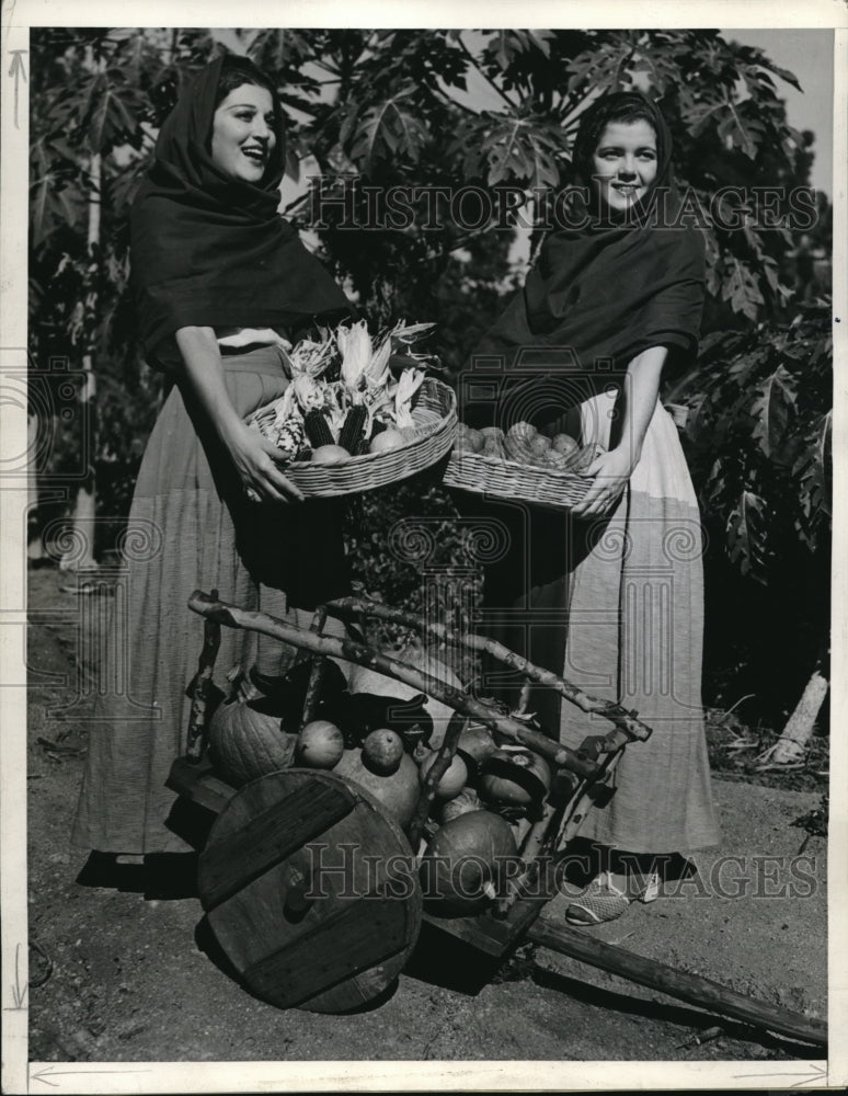 Load image into Gallery viewer, 1936 Press Photo Josephine Olea Mears and Evelyn Hurbard with fruit &amp; vegetables
