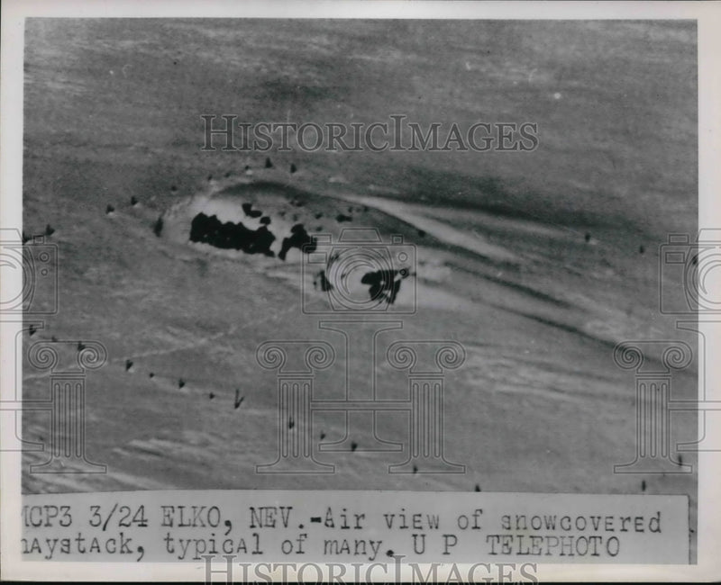 Load image into Gallery viewer, 1952 Press Photo Elko Nev air view of snow covered haystack typical of many
