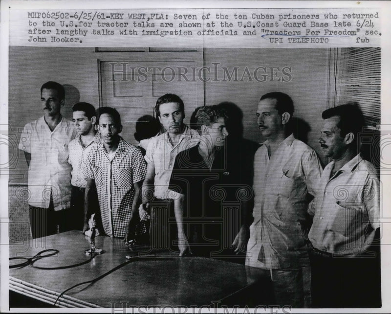 Load image into Gallery viewer, 1961 Press Photo Tractors for Freedom Sec. Hooker asks the Cuban prisoners
