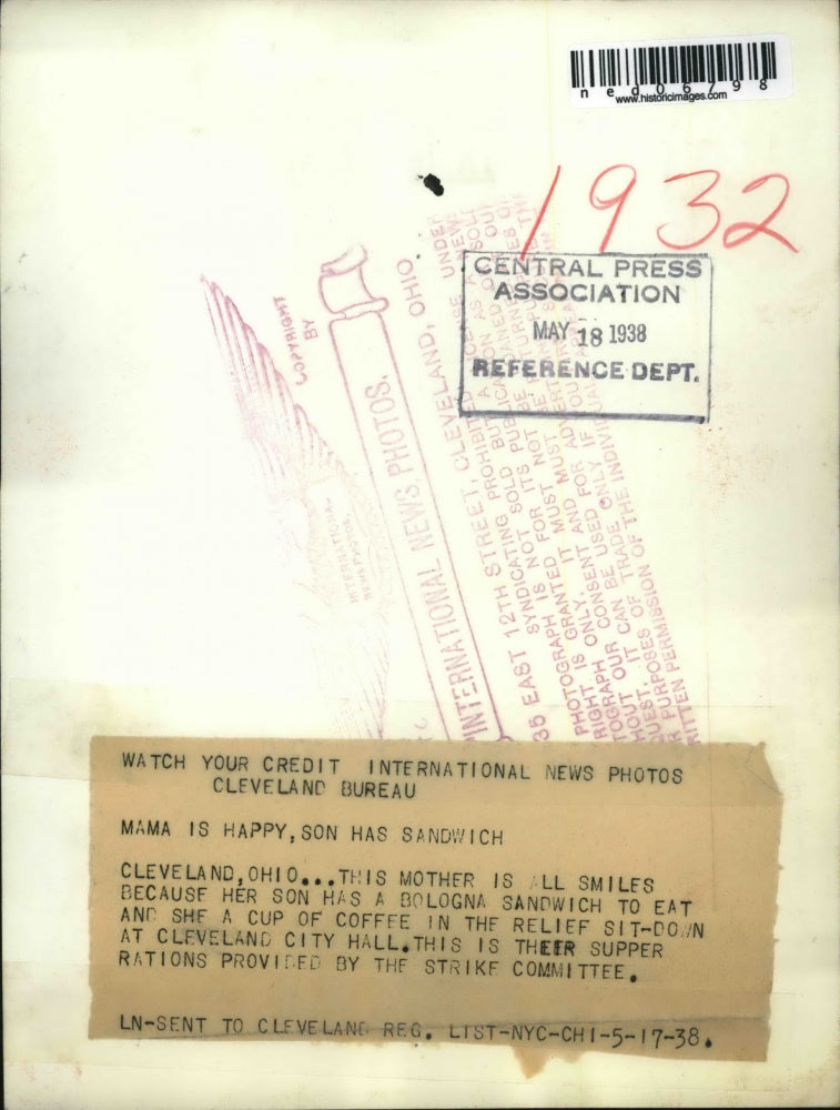 1938 Press Photo Cleveland Ohio Mother has cup of coffee and son