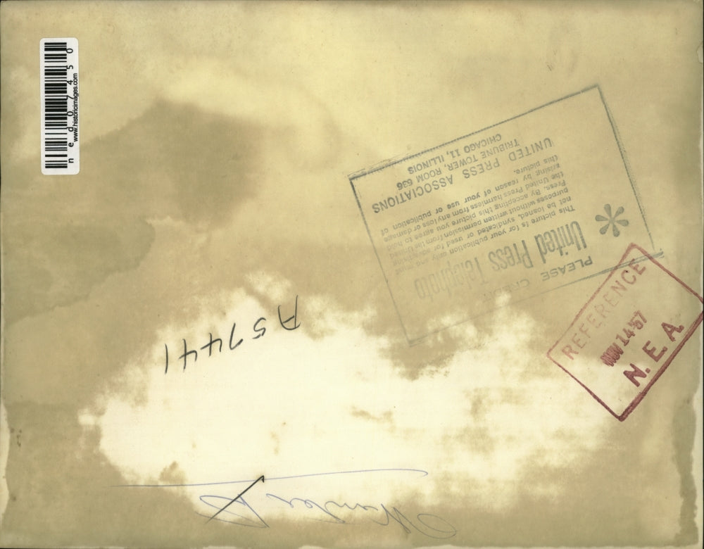 1957 Press Photo John O'Rourke pouring antifreeze into car, New York - ned07450