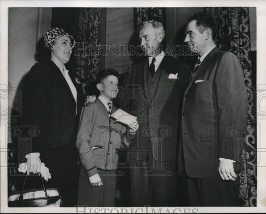 1959 Media Photo bank President Eugene Hooper with the Sicari family