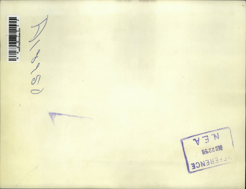 Load image into Gallery viewer, 1958 Press Photo A child tears into a present that says "Do not open until X-mas
