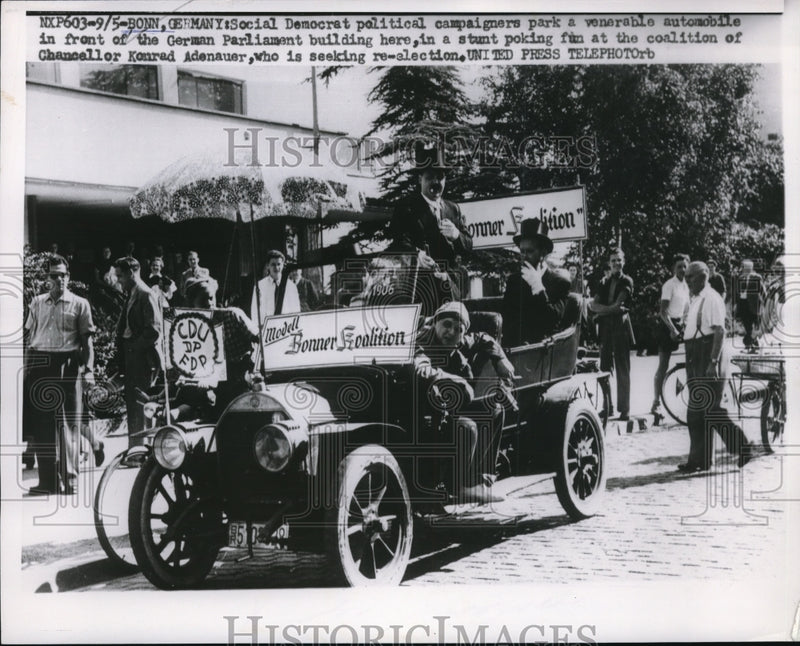 Load image into Gallery viewer, 1953 Press Photo Konred Adenauer riding a venerable automobile
