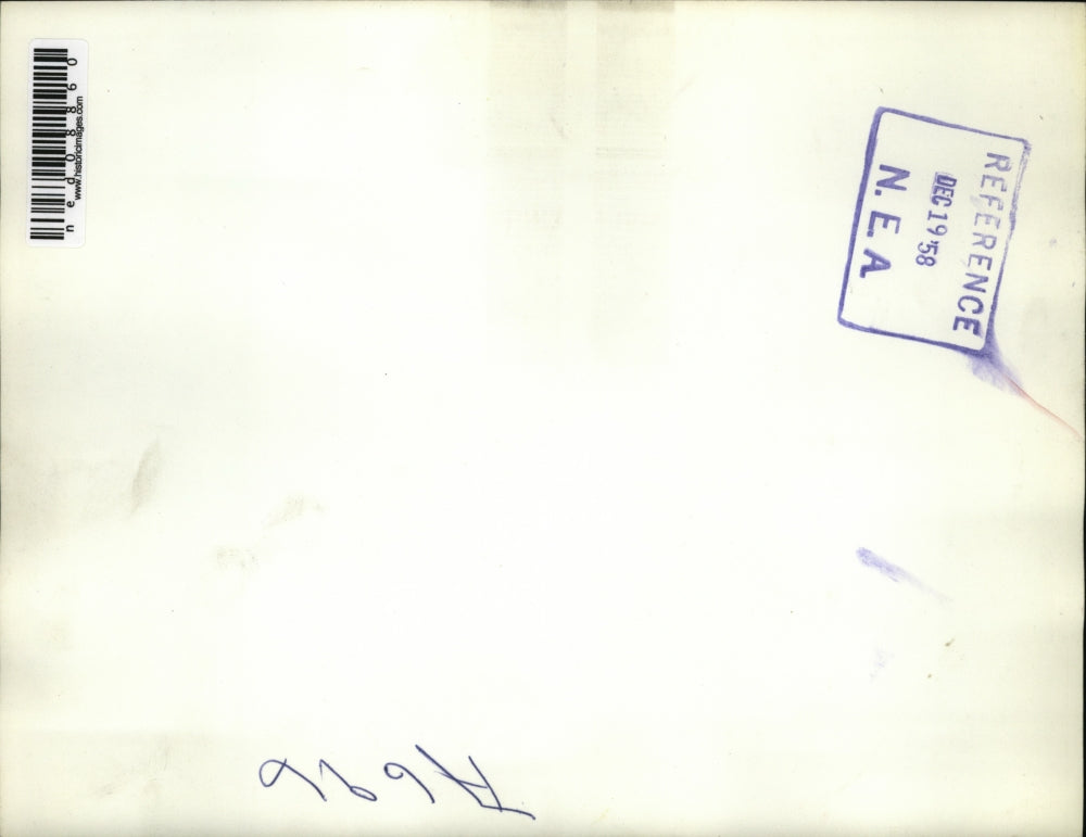 1958 Press Photo Sn Francisco employee James Long with the avalanche of packages