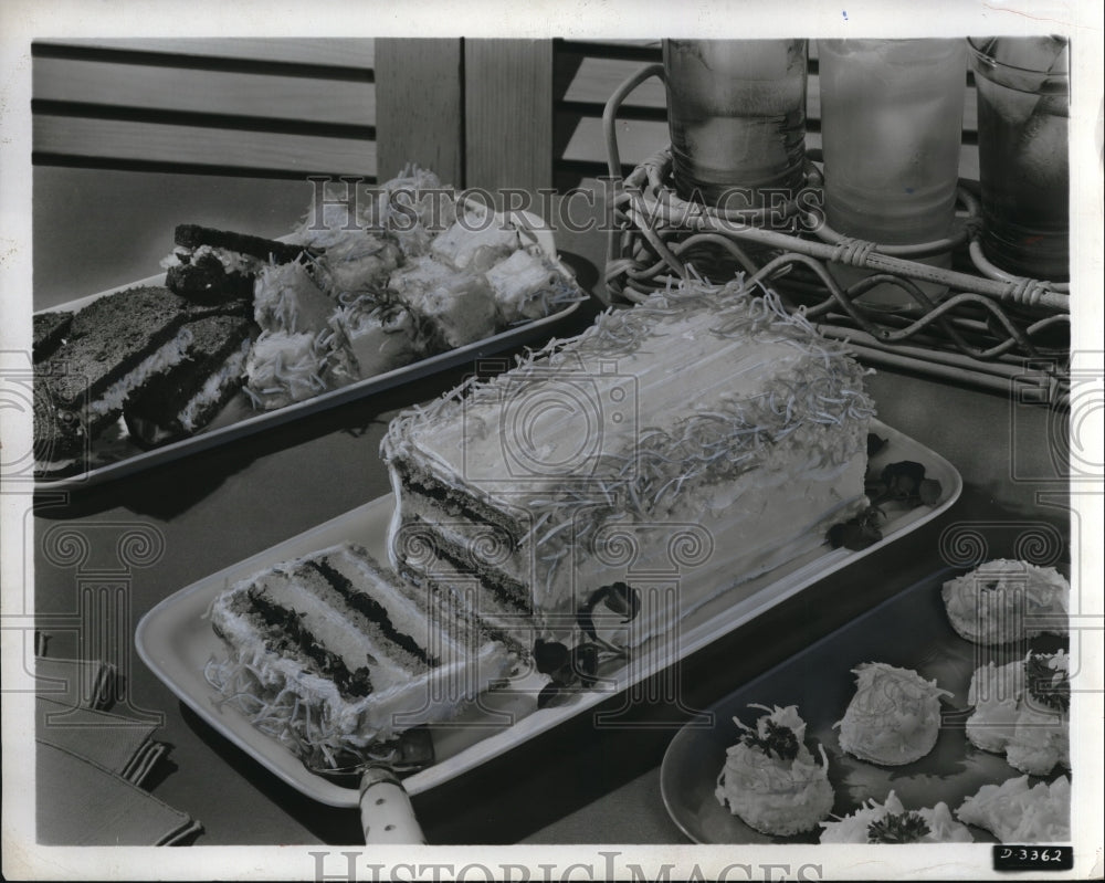 1955 Press Photo A coconut cheese layer cake on display
